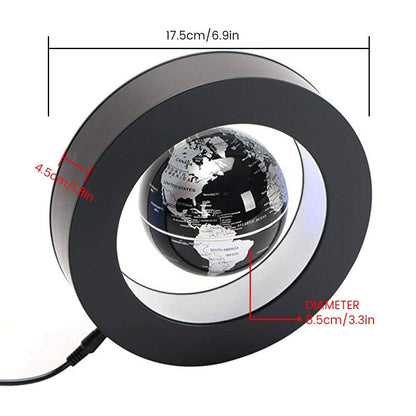 Lampada a LED con sfera a sospensione magnetica.